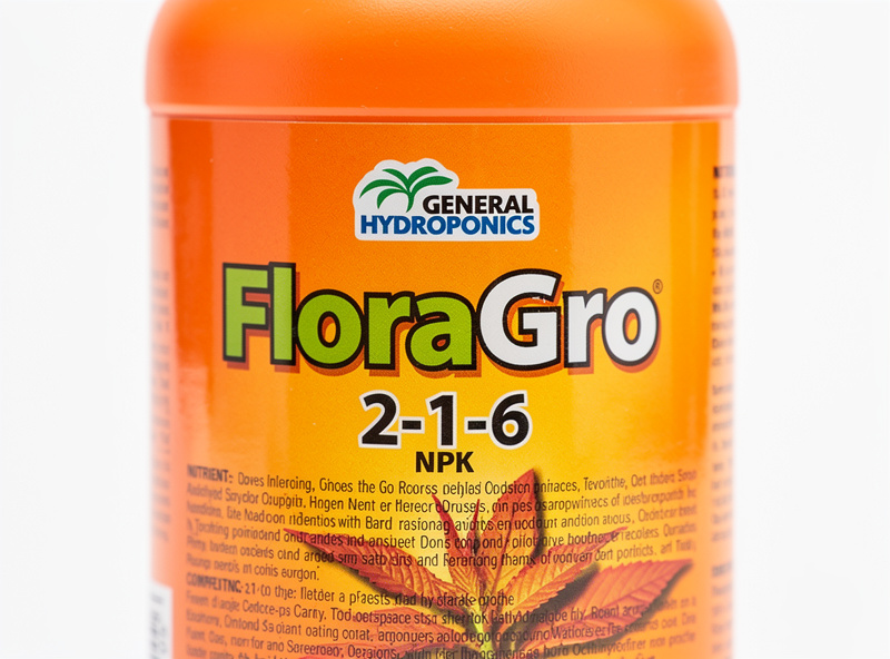 Close-up label detail of a General Hydroponics FloraGro bottle showing the orange label and 2-1-6 NPK ratio